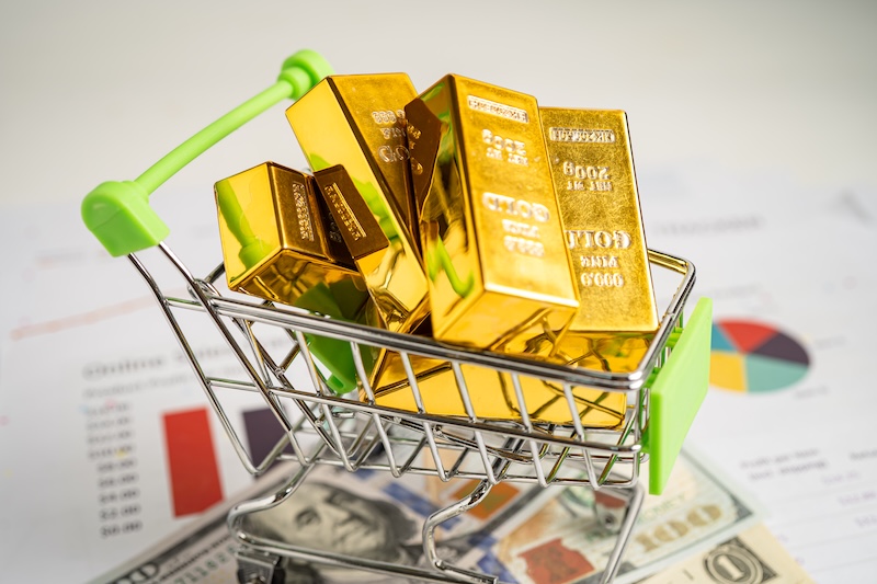 Guld i liten kundvagn